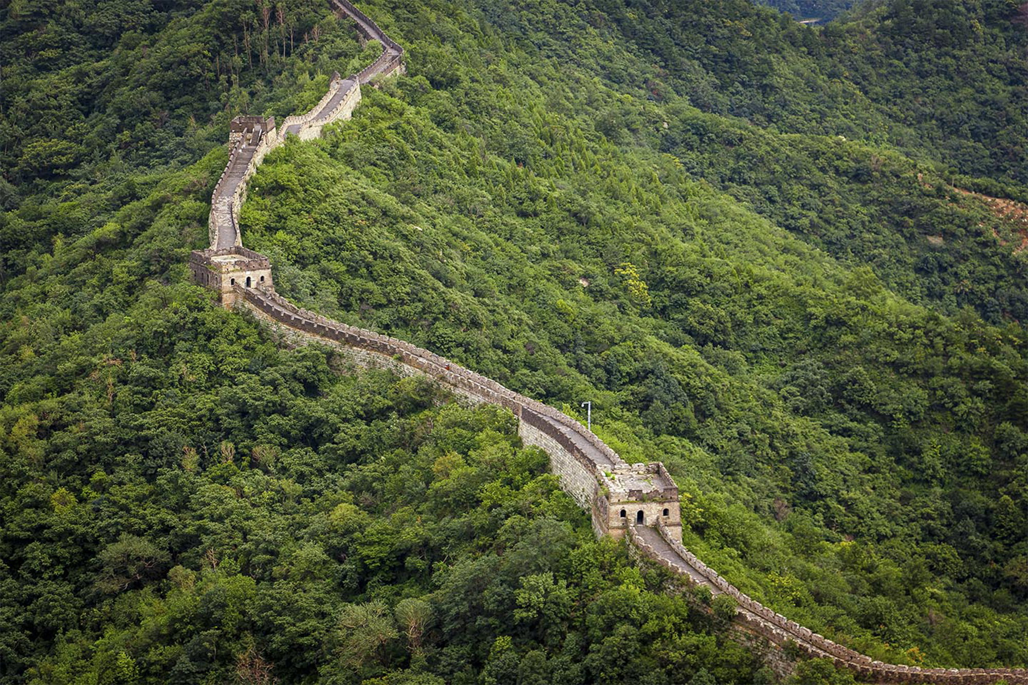 The Great Wall of China cutting through the landscape