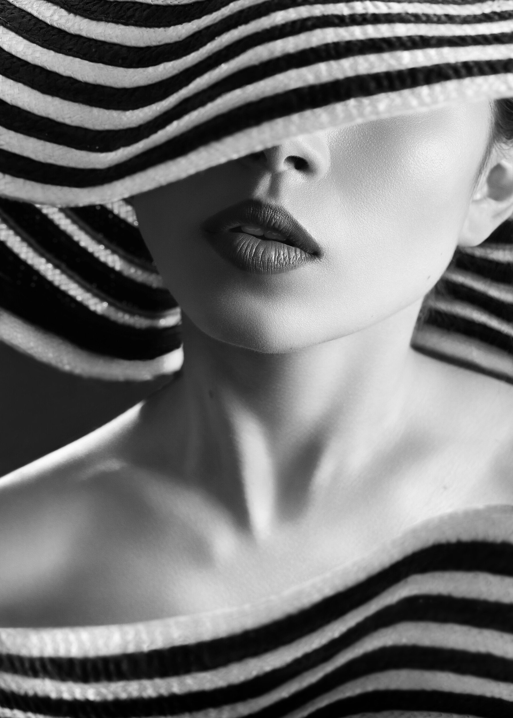 Elegant Striped Hat Portrait